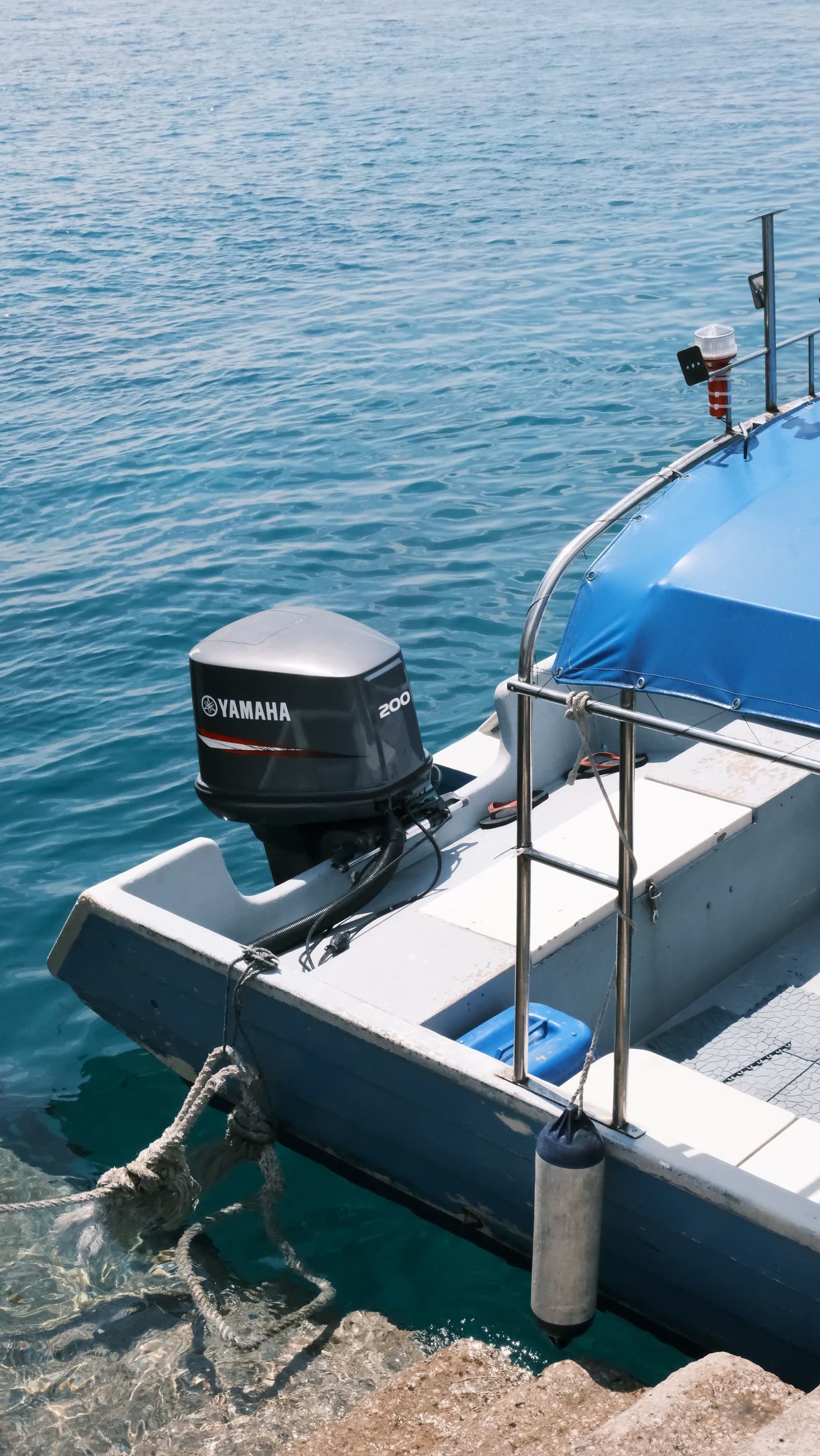 An outboard motor on a boat transom