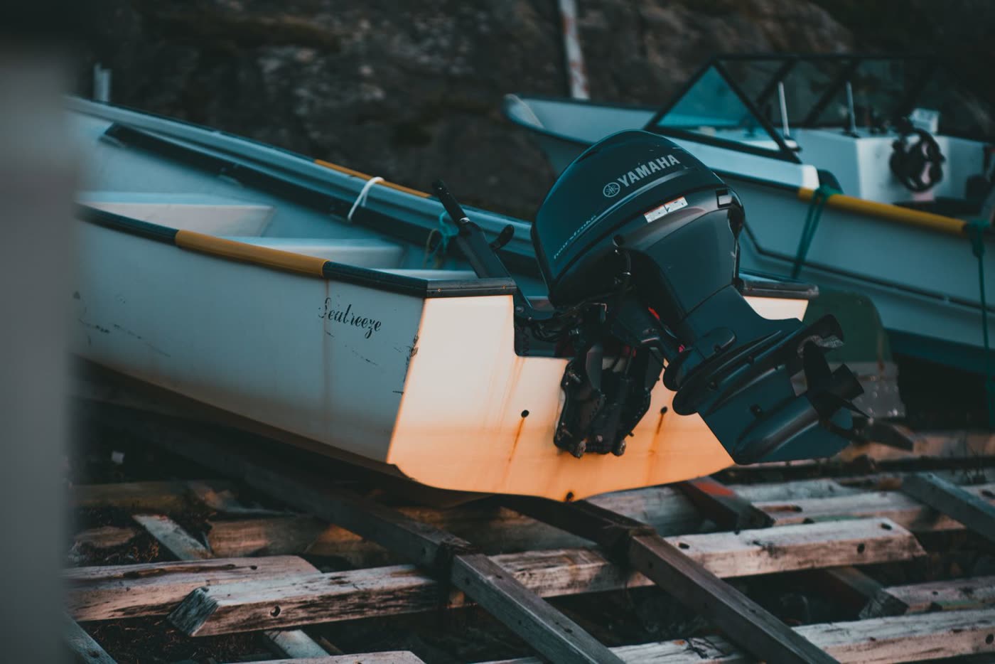 An outboard motor being serviced